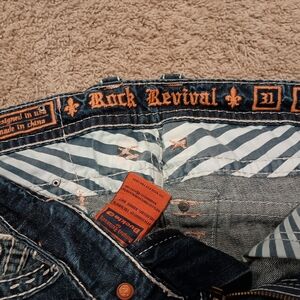 Rock Revival Denim with Blue and Orange Accents